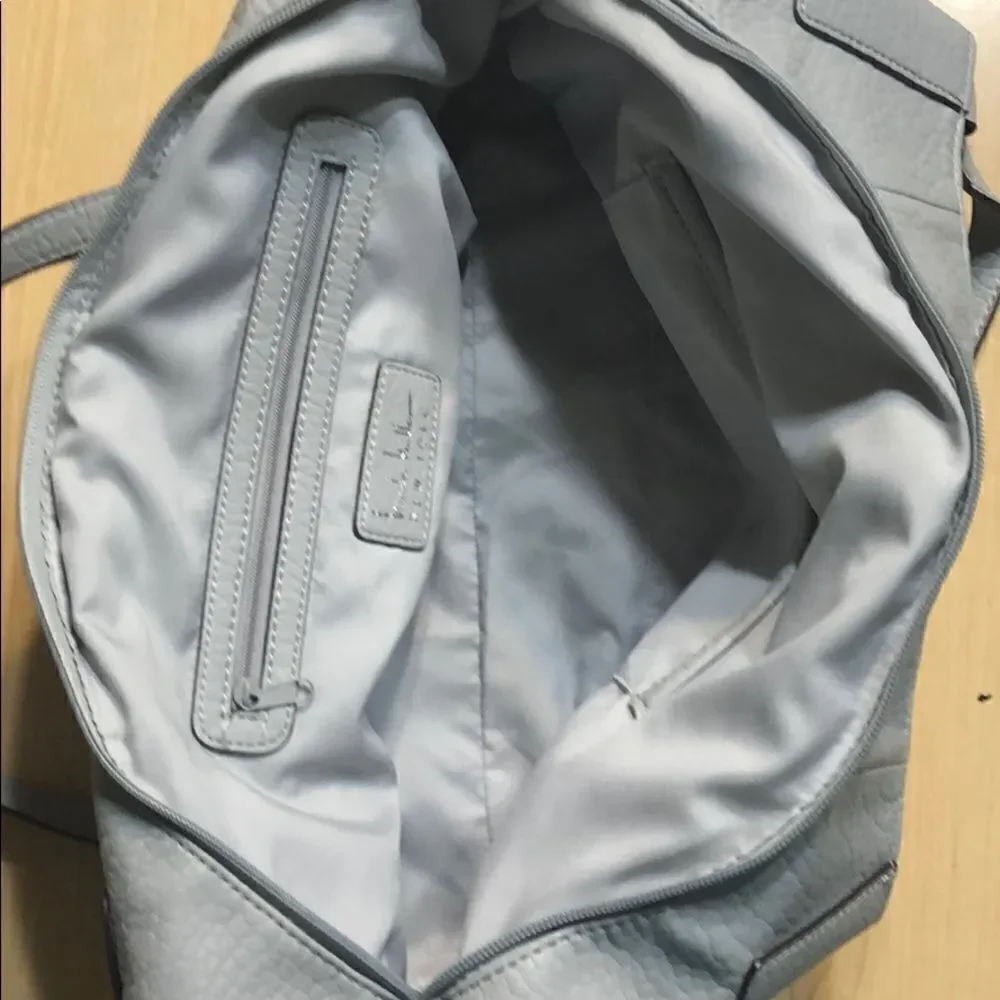 Light blue grey color tote. NWOT